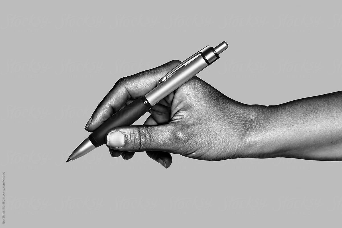 Hand Writing With Silver Pen Black And White Photo By Stocksy