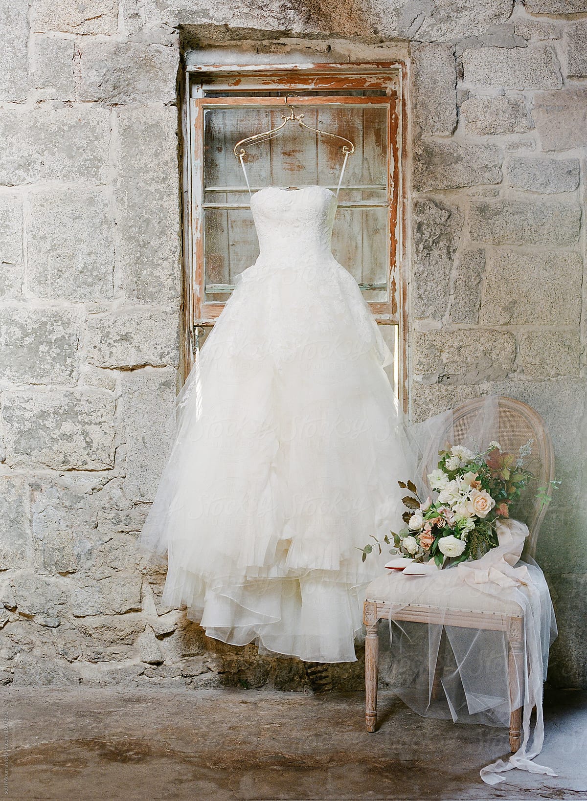 Hanging wedding gown & Brides details