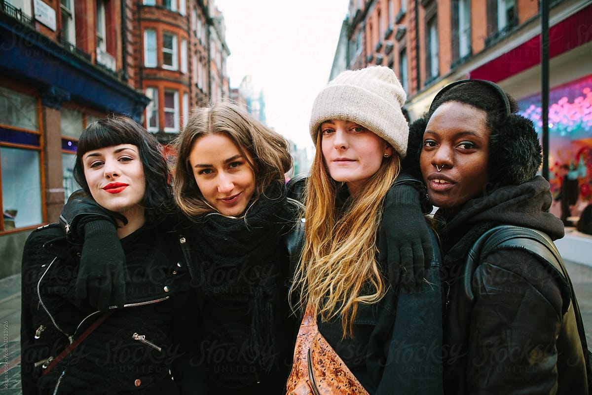 Group of young women having fun around London
