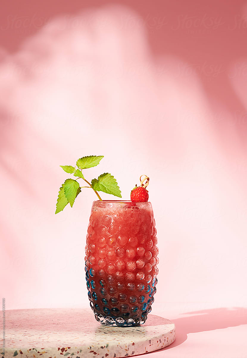 Strawberry Cocktail with Palm Leaf Shadows