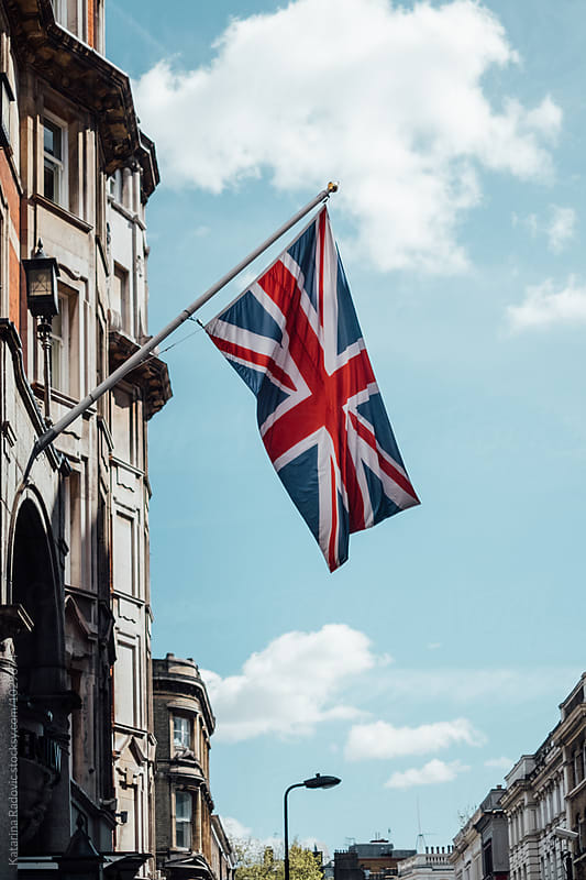 London Street With England Flag Swinging