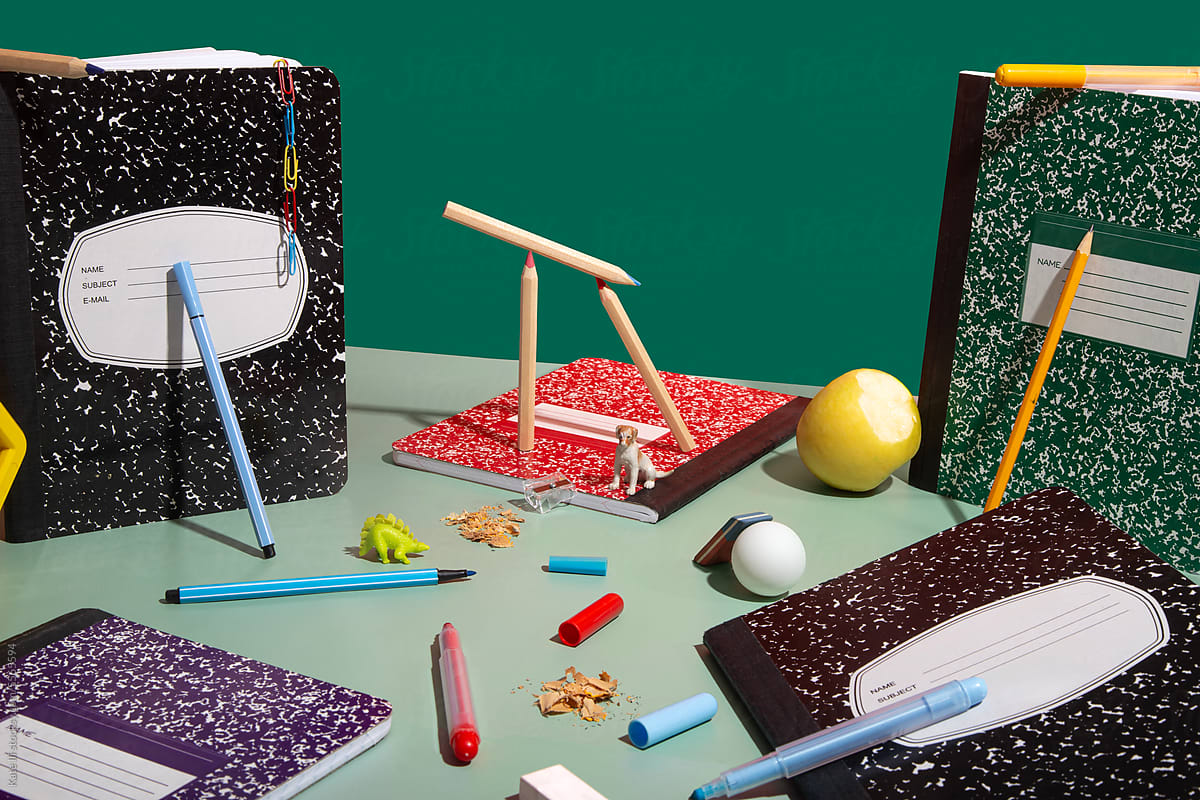 "Creative messy school table" by Stocksy Contributor "Kate Ili"
