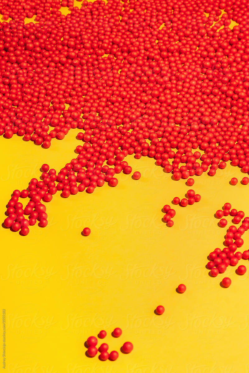 Bunch Of Red Round Shapes-Balls On Yellow Background.