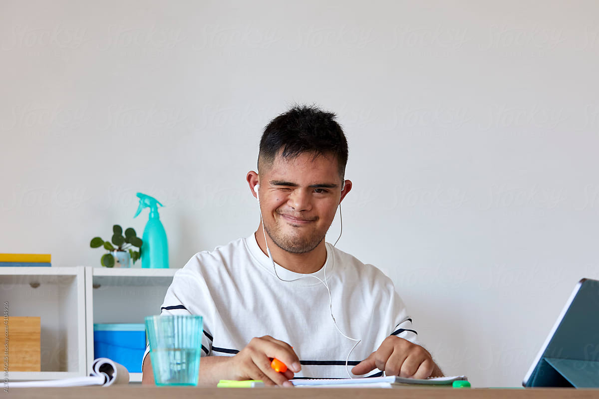 Student with Down syndrome doing homework