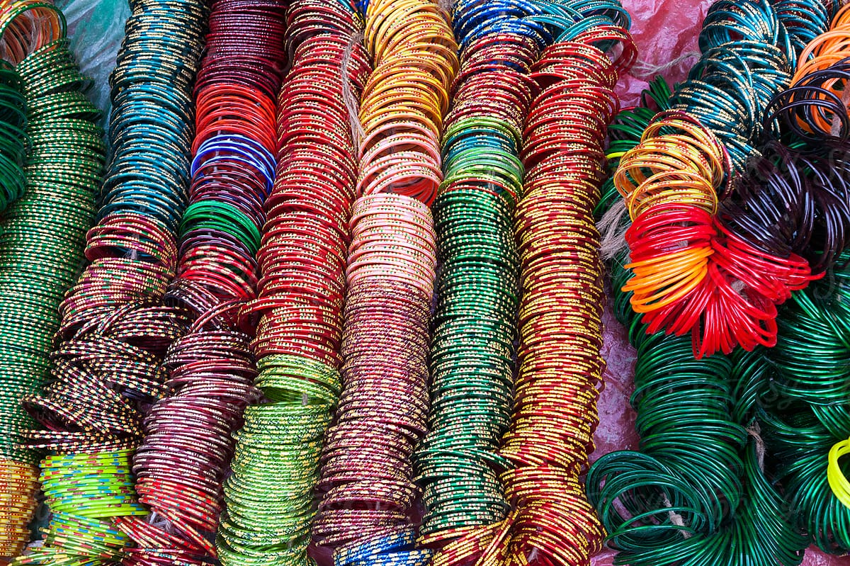 vibrant colorful bangles for sale at a bazaar in Asia.
