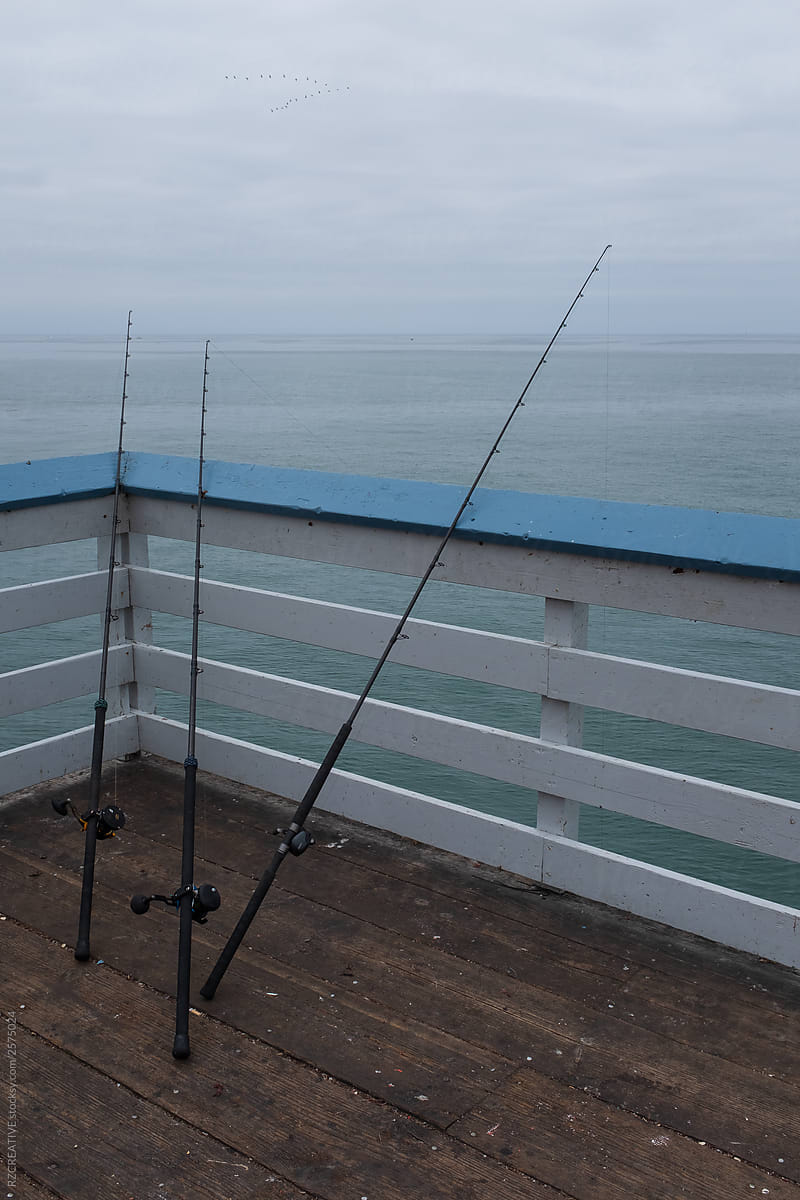Fishing polls on pier.