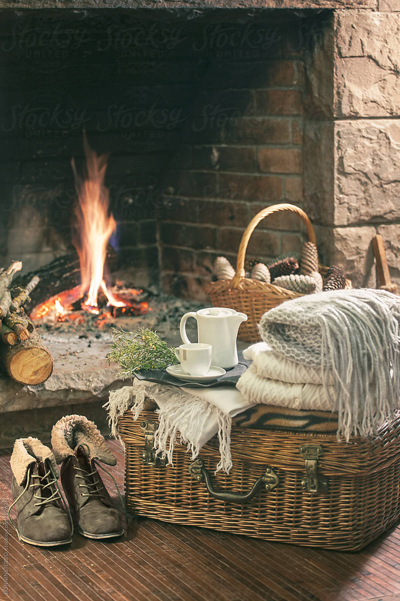 Cozy Home. Still Life Of Woman's Boots, Blankets And Kettle In Front  Fireplace. by Stocksy Contributor BONNINSTUDIO  - Stocksy