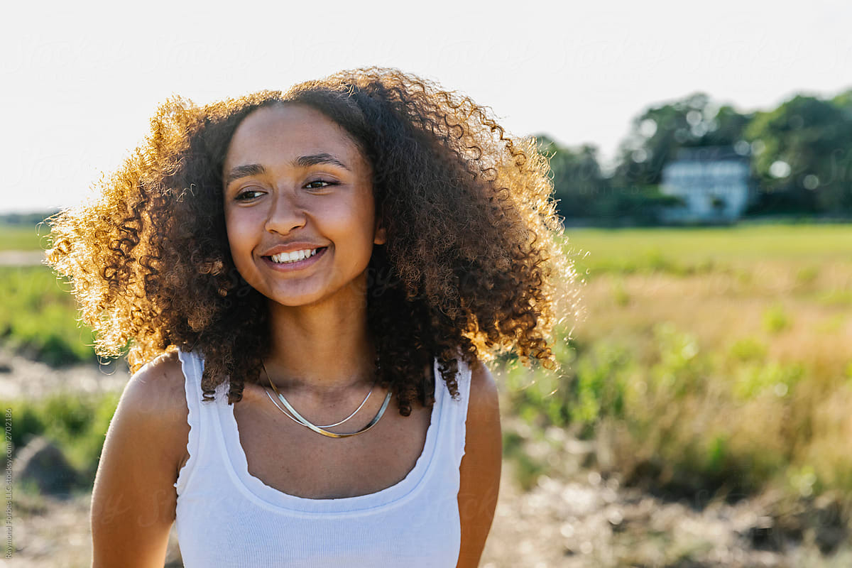 Portrait Of Beautiful Young African American Teen Girl Outside By