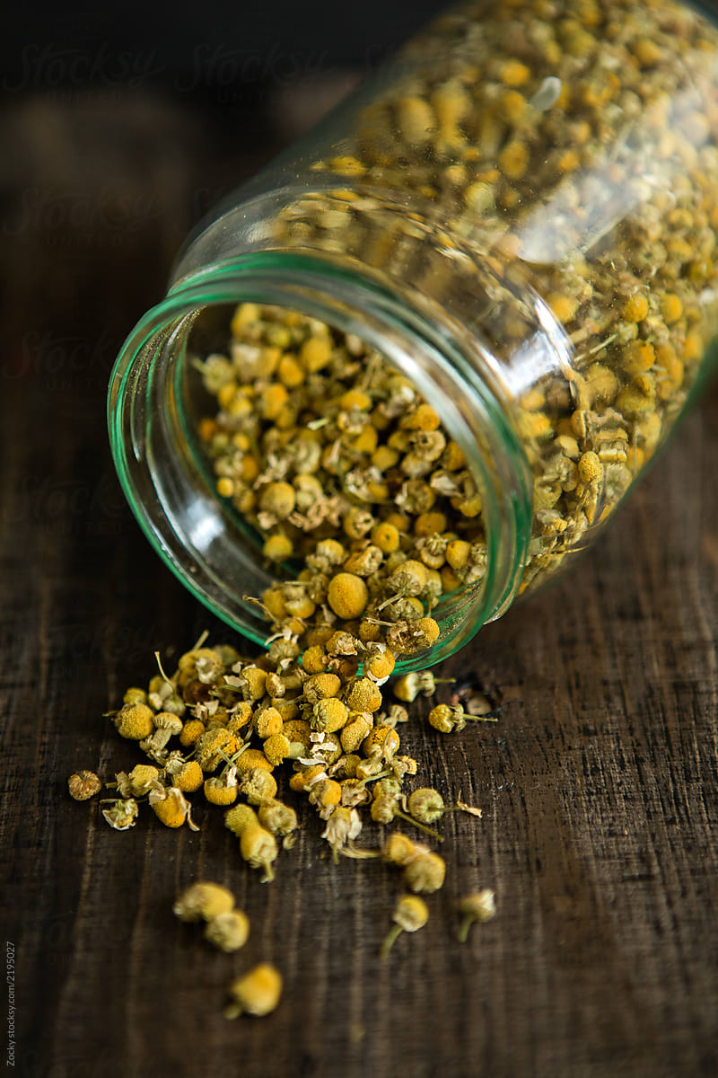 Close Up Of Camomile Flower Tea In A jar