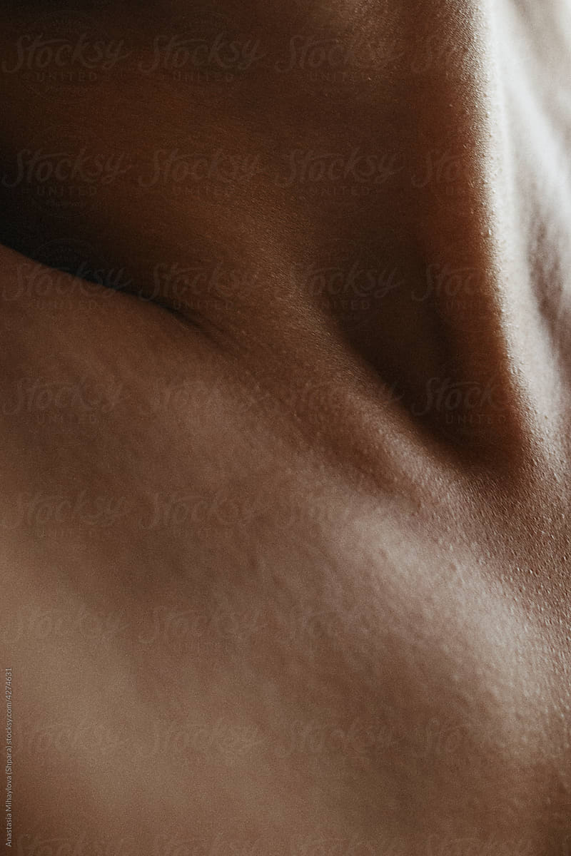 Close up vertical photo of woman's neck skin texture
