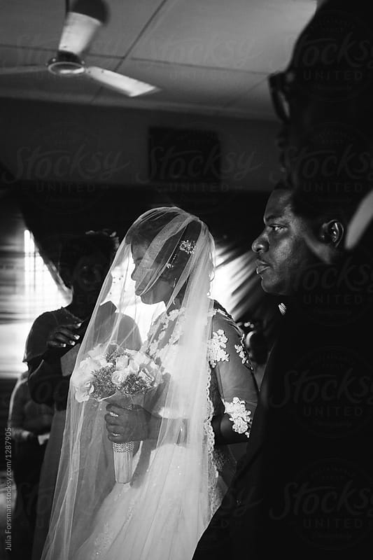 The bride makes her vows during an African wedding ceremony.
