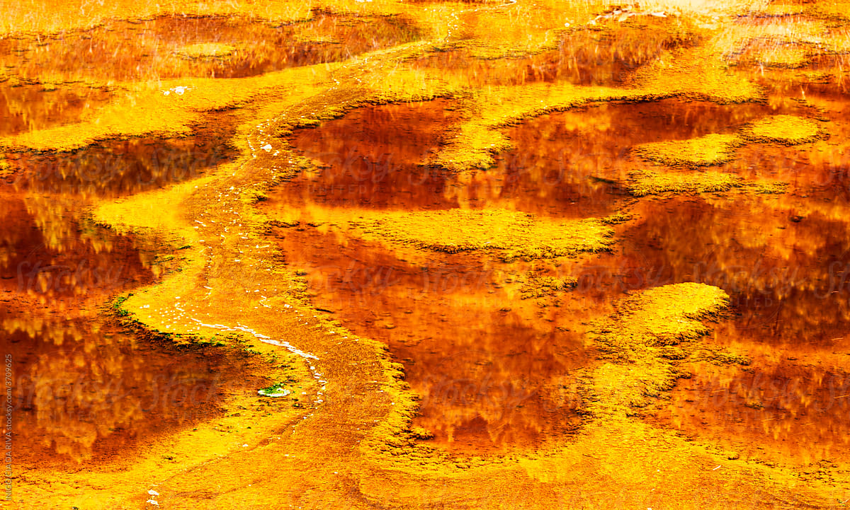 Abstract background of river with red and orange water