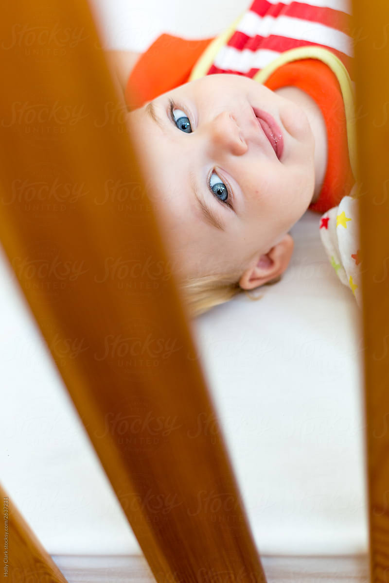 Closeup of Blond Boy in Crib