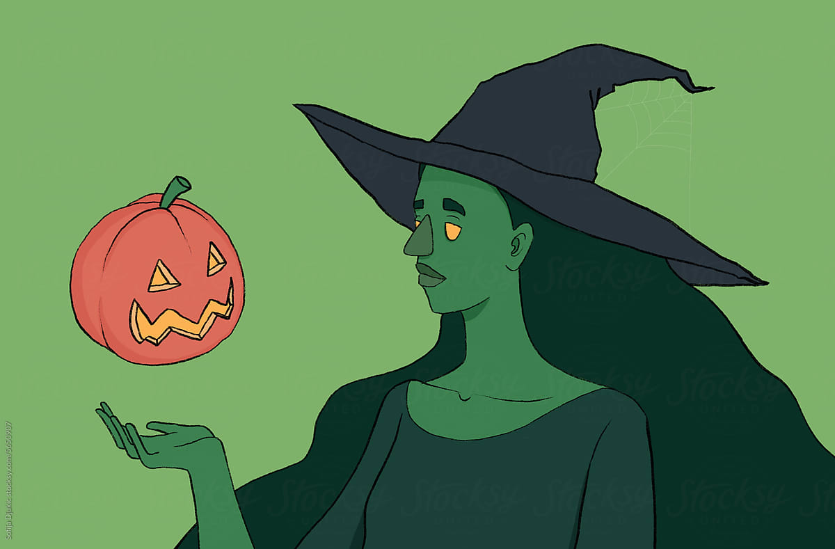 Young witch with big black hat holding a Halloween pumpkin