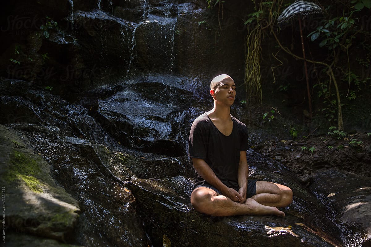 Man meditating in nature
