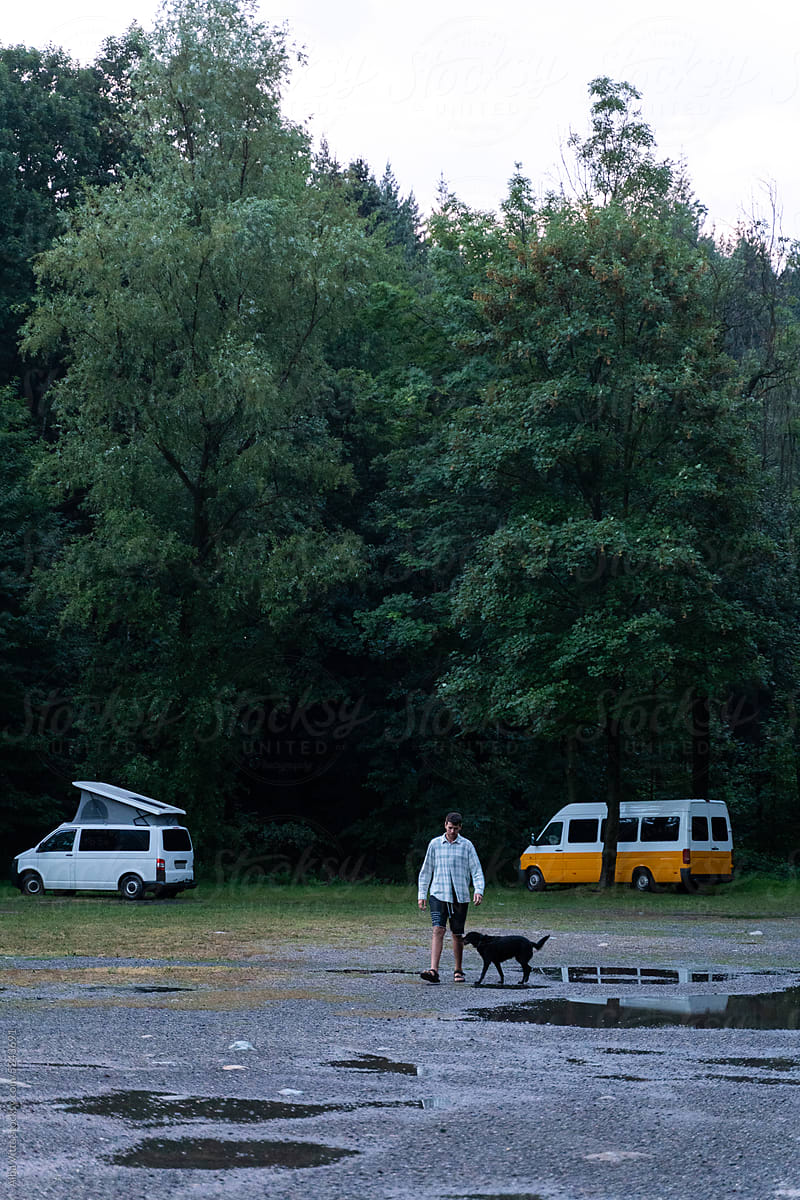 Man and dog in camper van