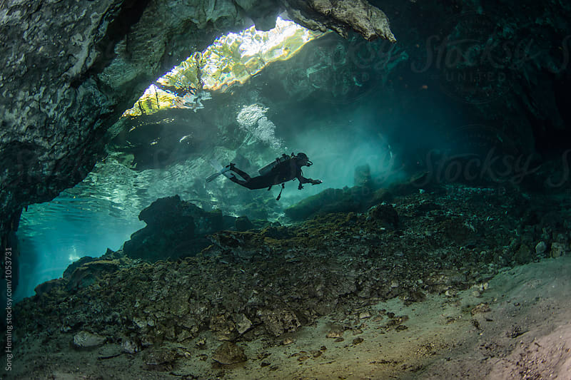 A scuba diver swimming in Mexico\'s  Cenote Gran