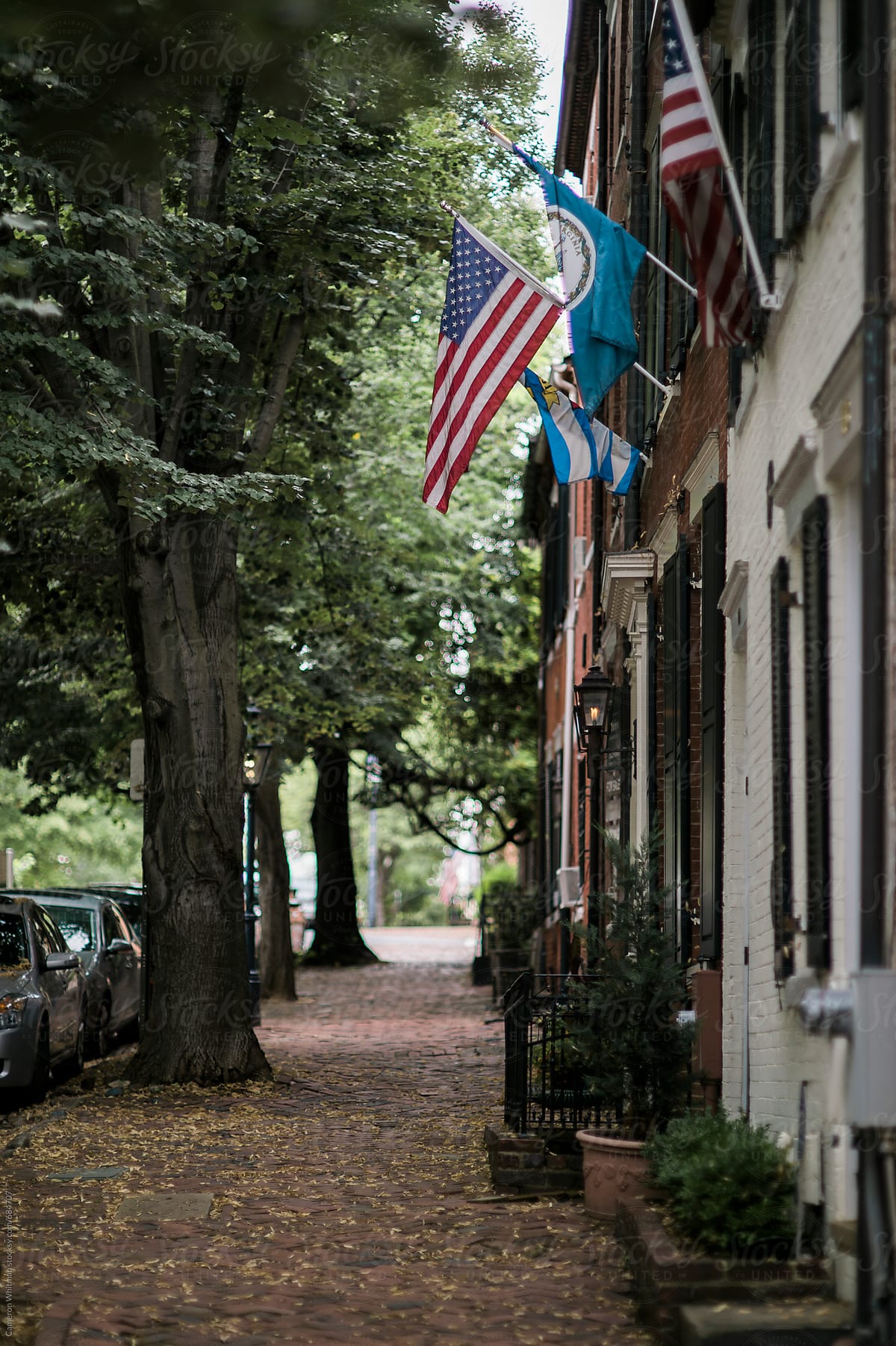 Neighborhoods In Old Town Alexandria Adorned With American Flags