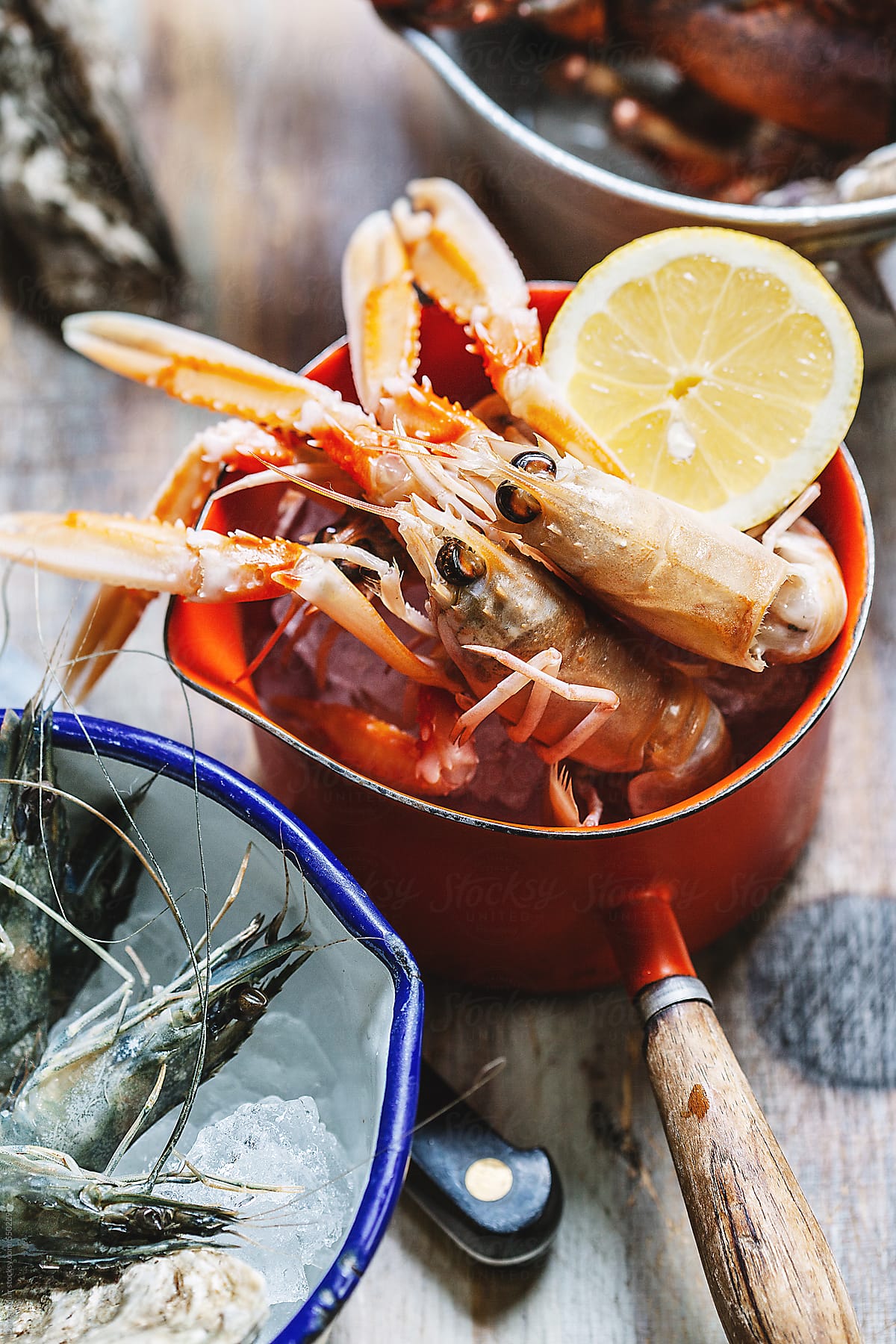 Seafood in pot on table
