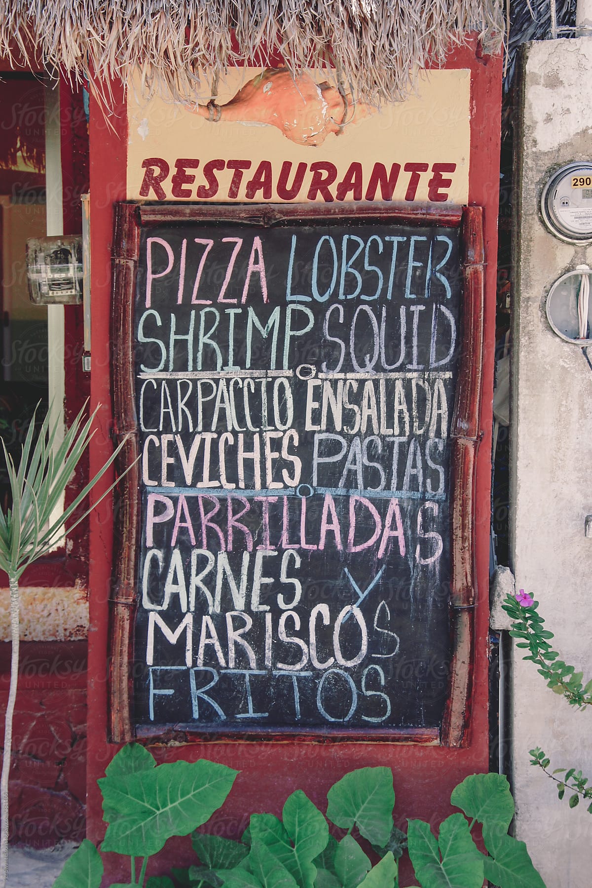 Road side handwritten menu board outside Mexican restaurant