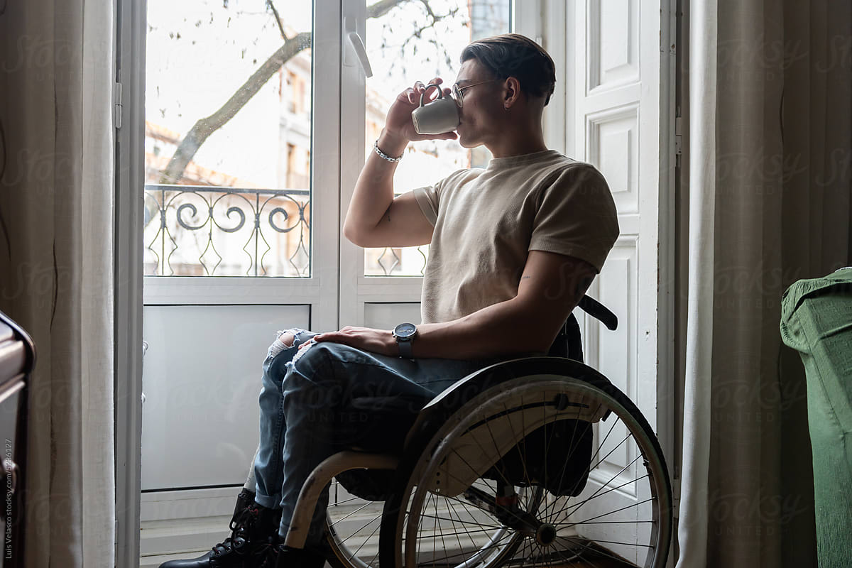 Person With A Disability Drinking From A Cup