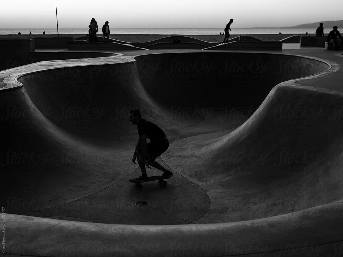 silhouetted bowl skater