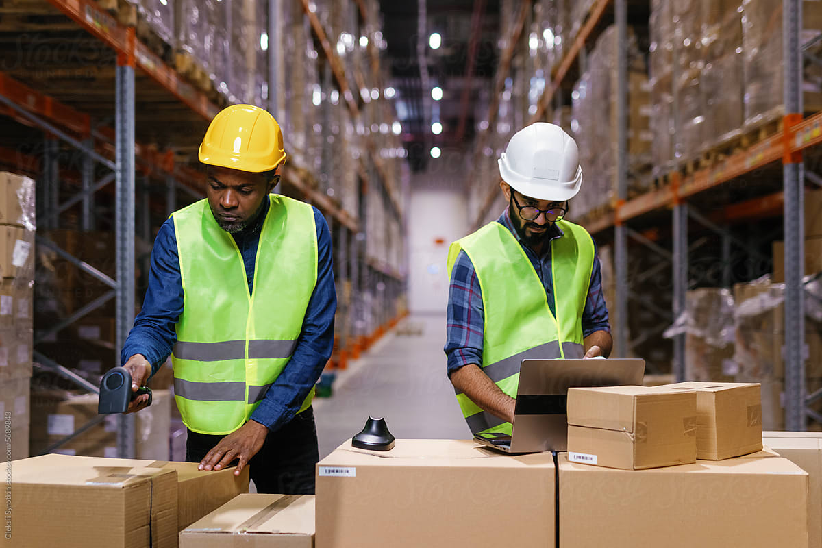 Common work warehouse employees using business devices