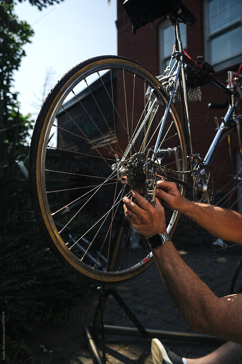 Repairing the bicycle\'s wheel