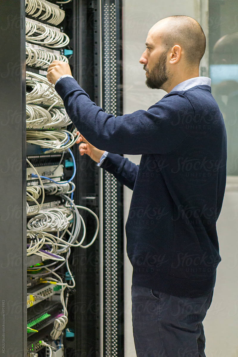 IT employee working in a data center
