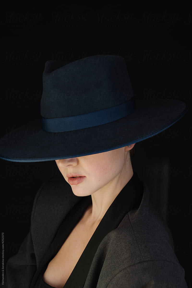 Dramatic Anonymous Woman Wearing Hat Portrait
