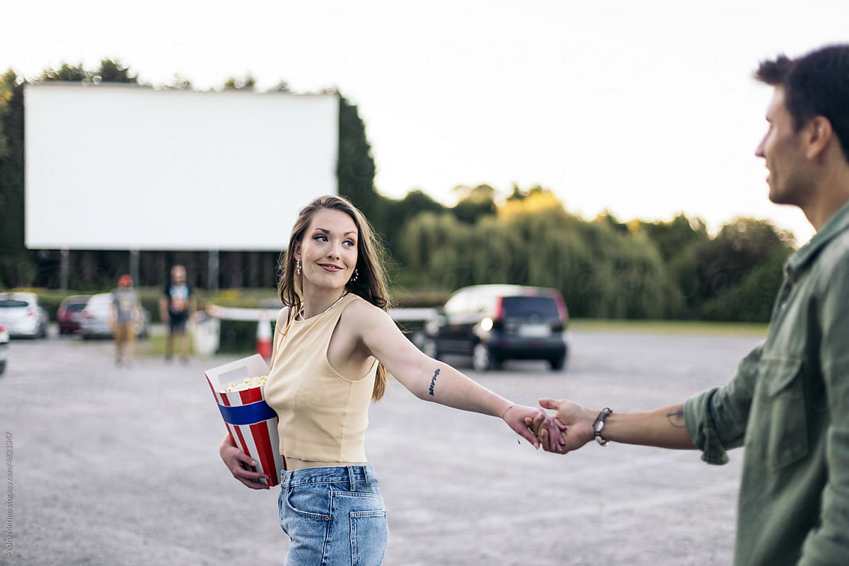 Couple having a date at the drive-in cinema