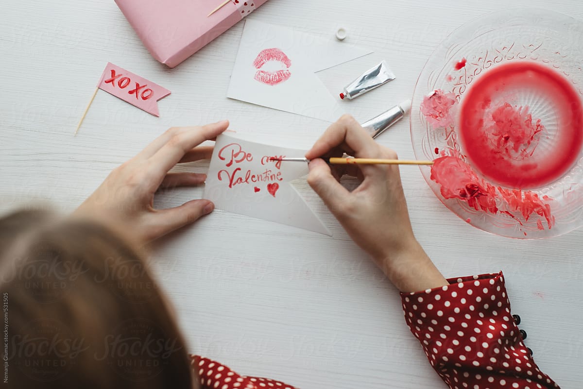 Woman Painting Romantic Cards For Valentine's Day
