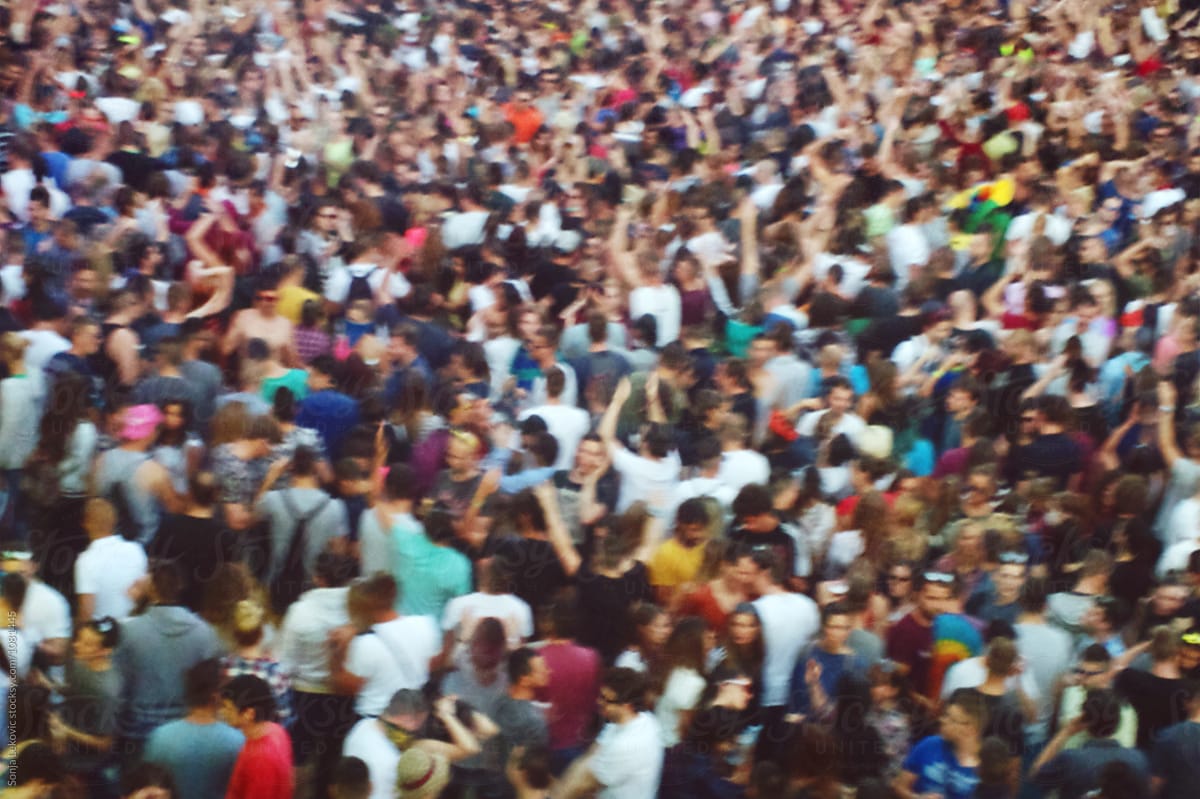 crowd of people in blur