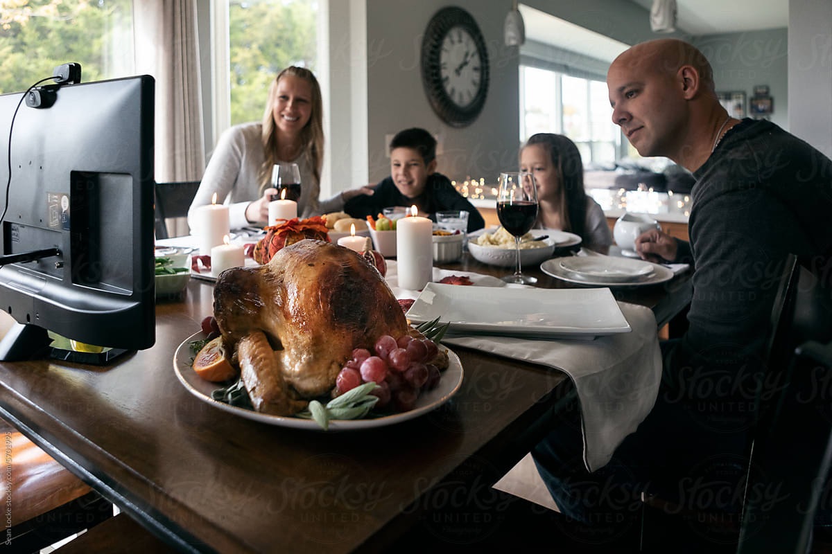 Thanksgiving: Family Talks To Relatives Before Digging In To Tur