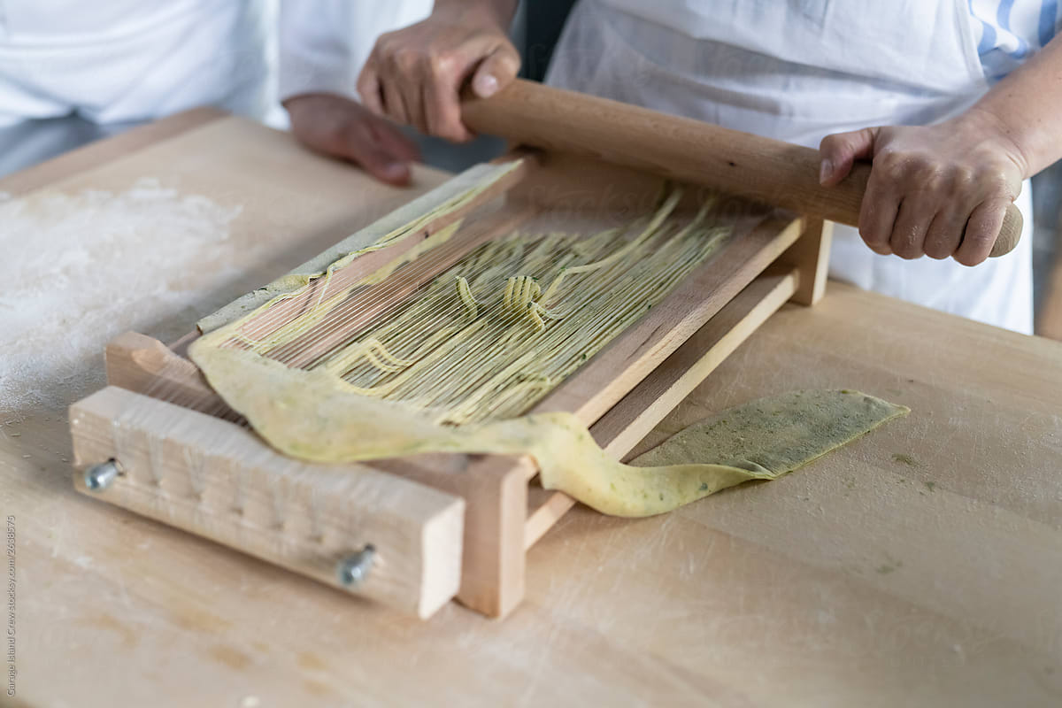 Making pasta during a kitchen lesson