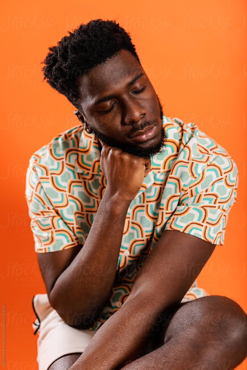 African model man in summer print clothes studio portrait