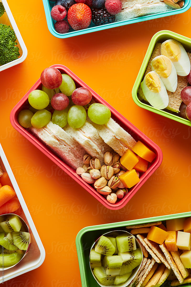 Top view of school lunchbox with food.