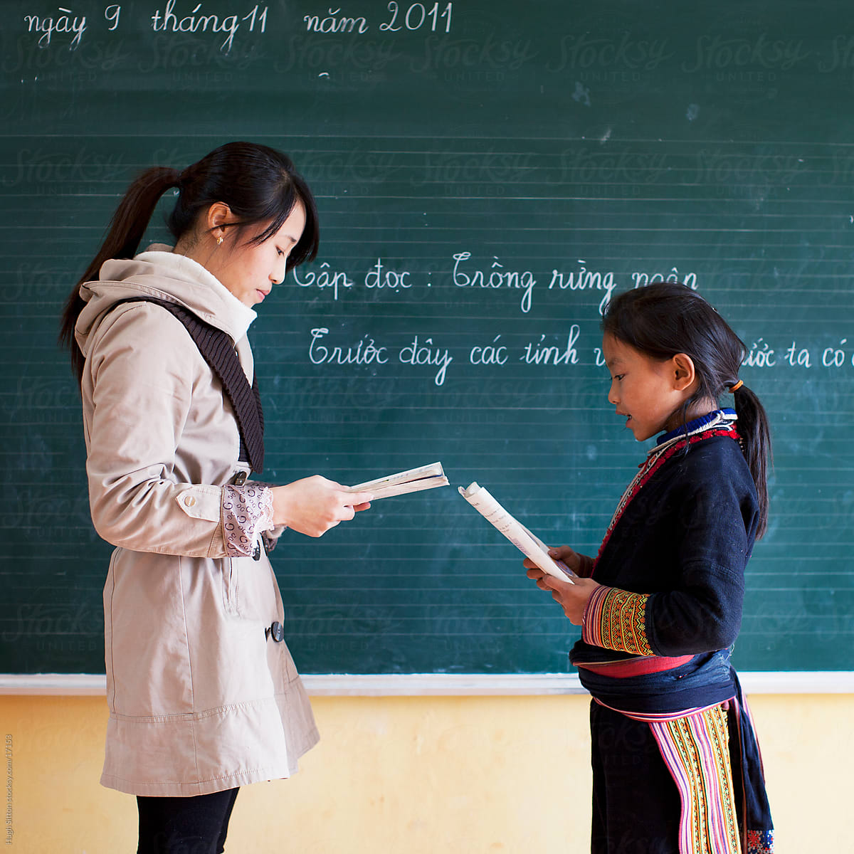 School children in classroom with teacher. (Red Dao tribe).