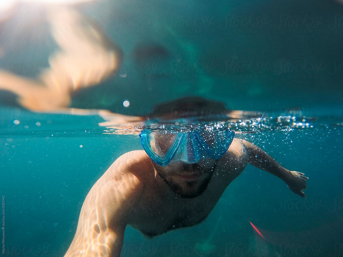 Underwater selfie of young man snorkeling