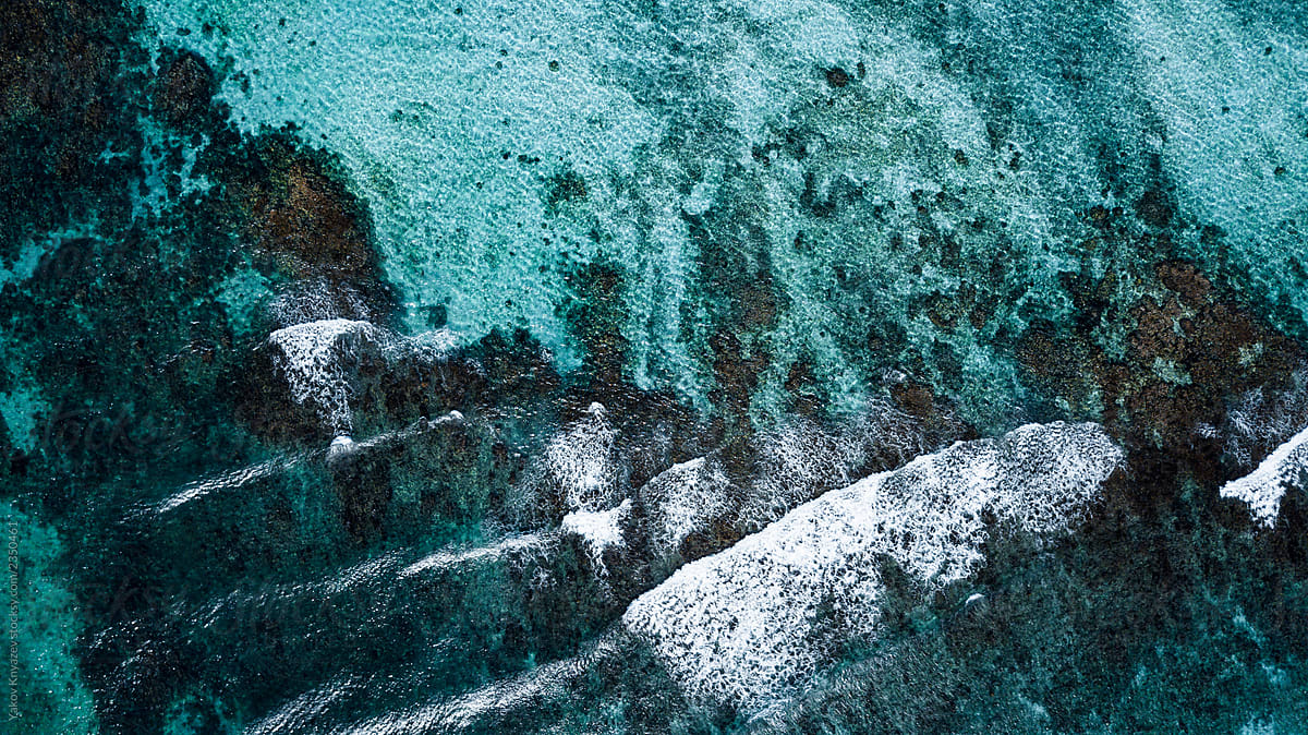 Drone View Of A Tropical Beach - coral reef with transparent water