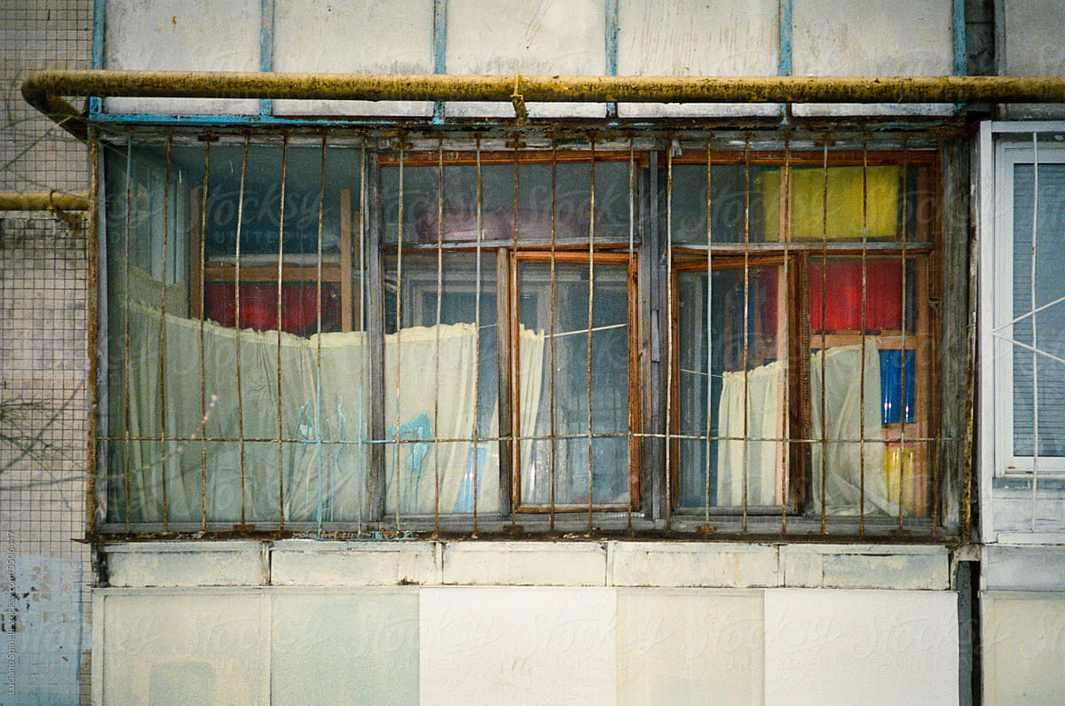 Vintage analog photography of rusty colorful window
