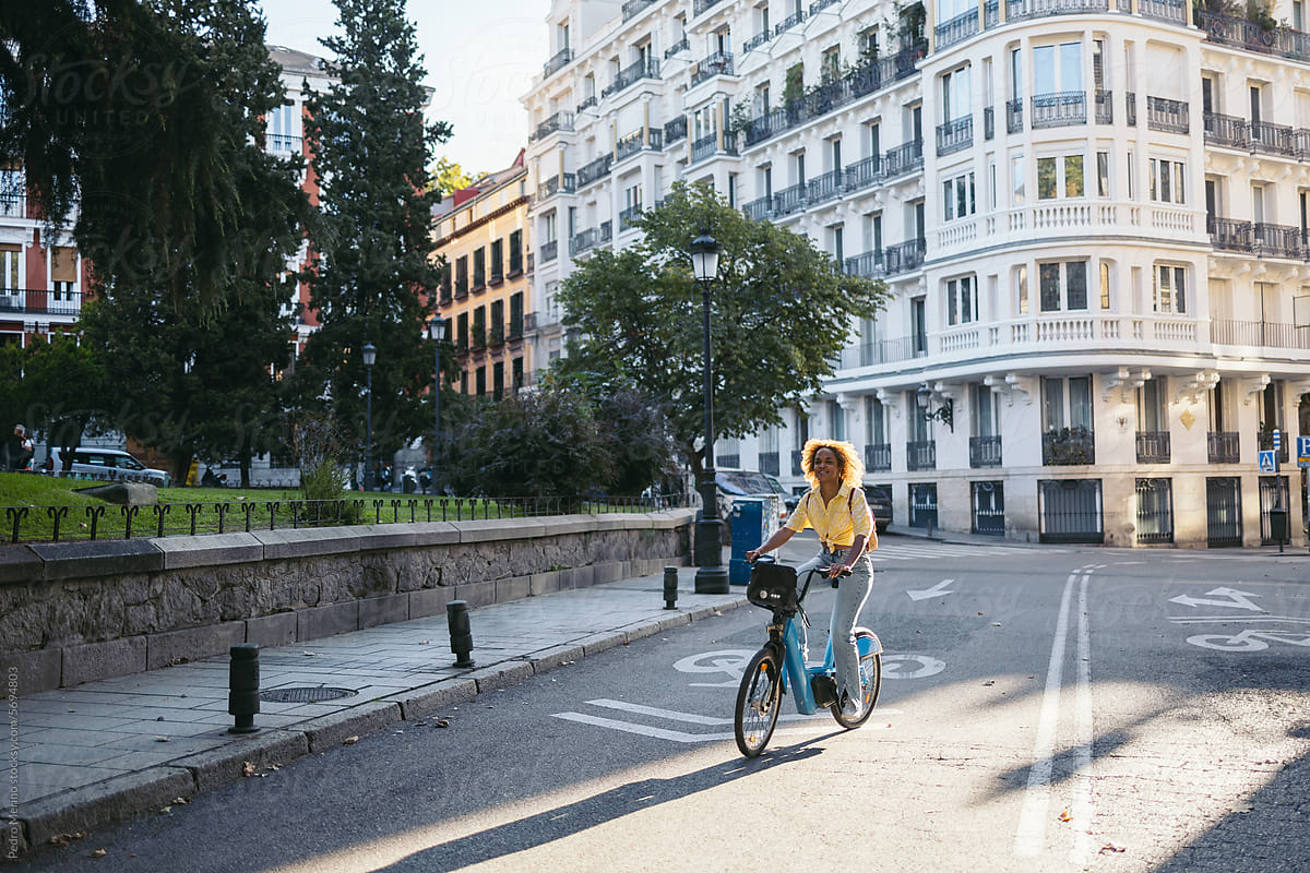 Woman using an electric bike in the city