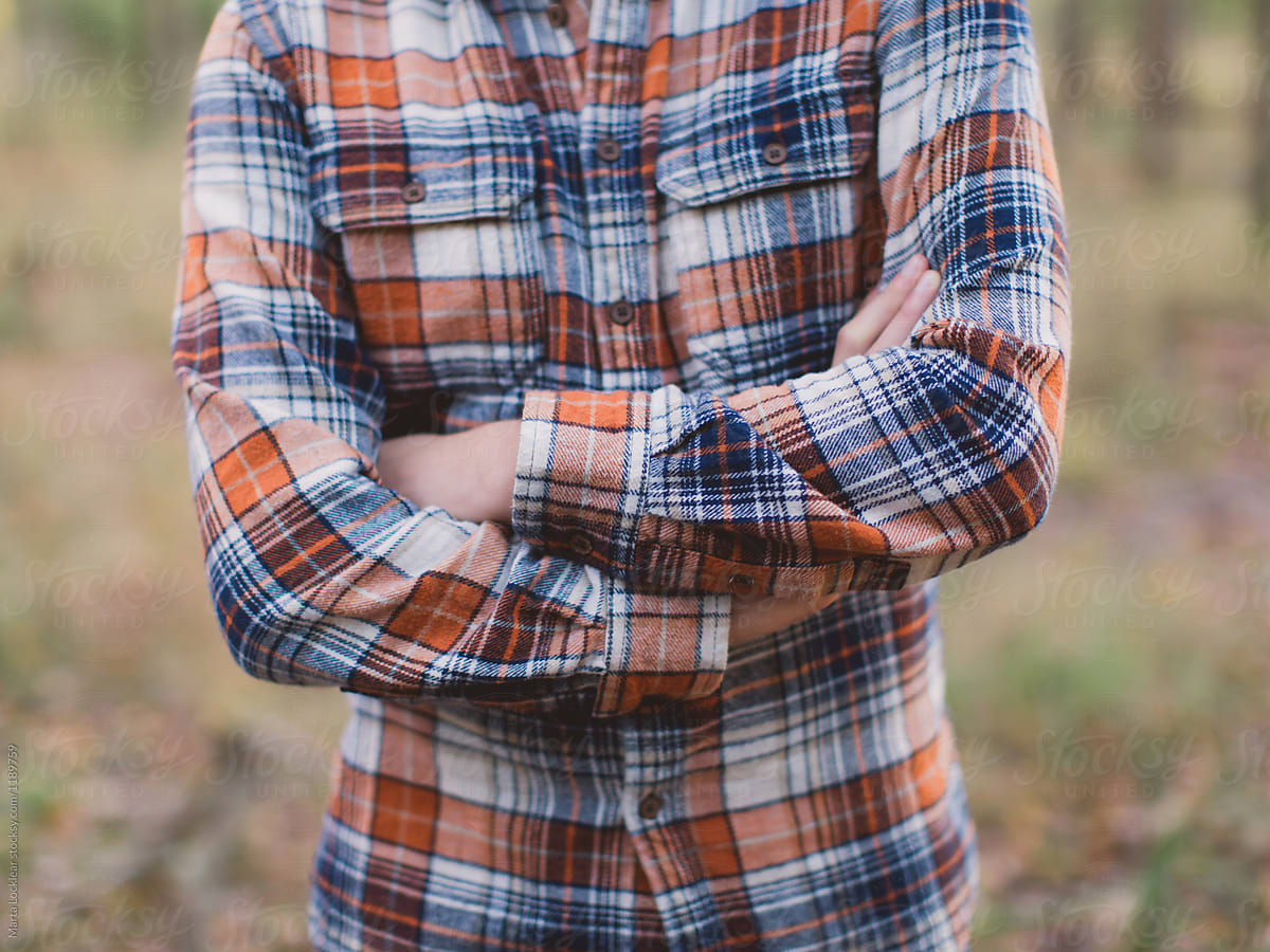 Crossed Arms in Plaid