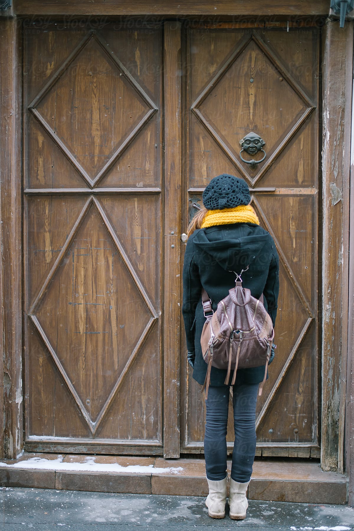 Anonymous Woman Standing By The Door By Stocksy Contributor Mosuno Stocksy 6490