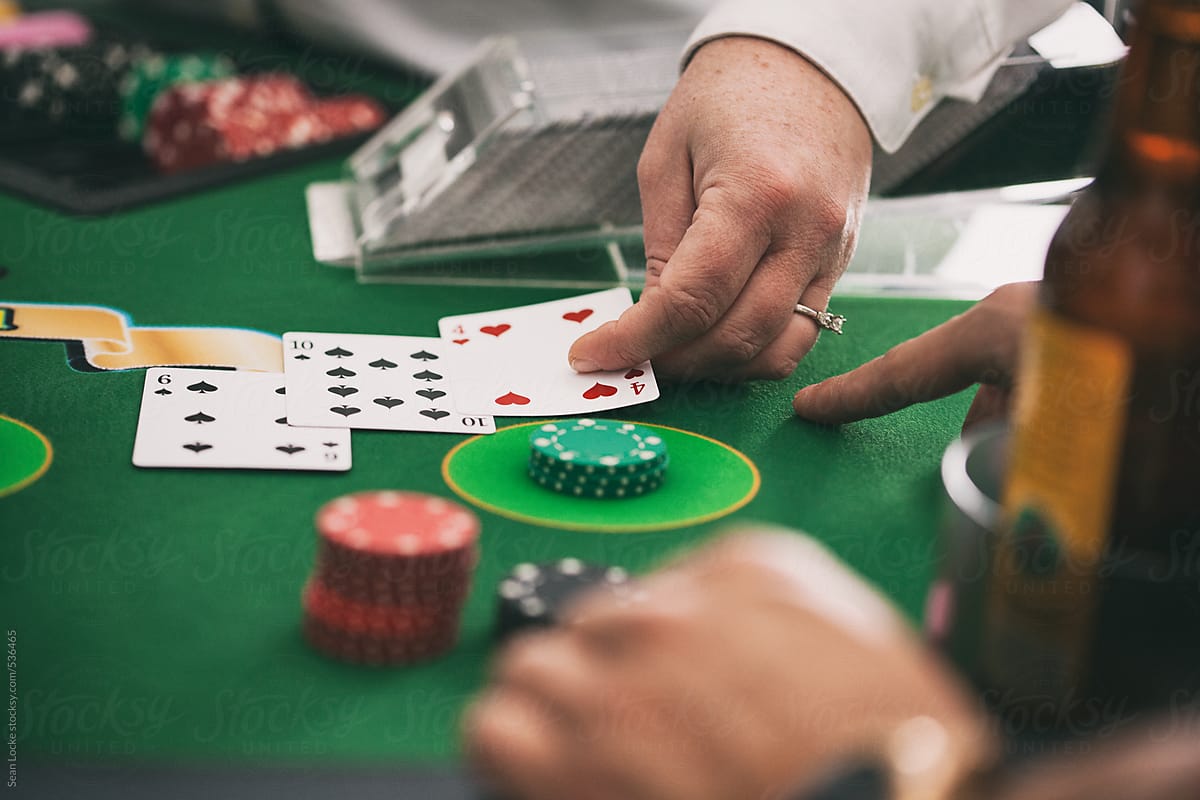 Casino: Man Hitting In Blackjack On Sixteen And Gets Twenty