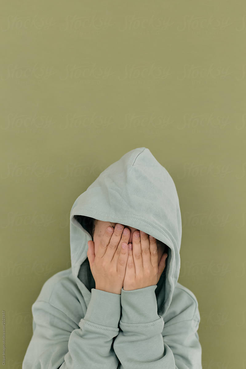 Boy Wearing Hood Hiding His Face