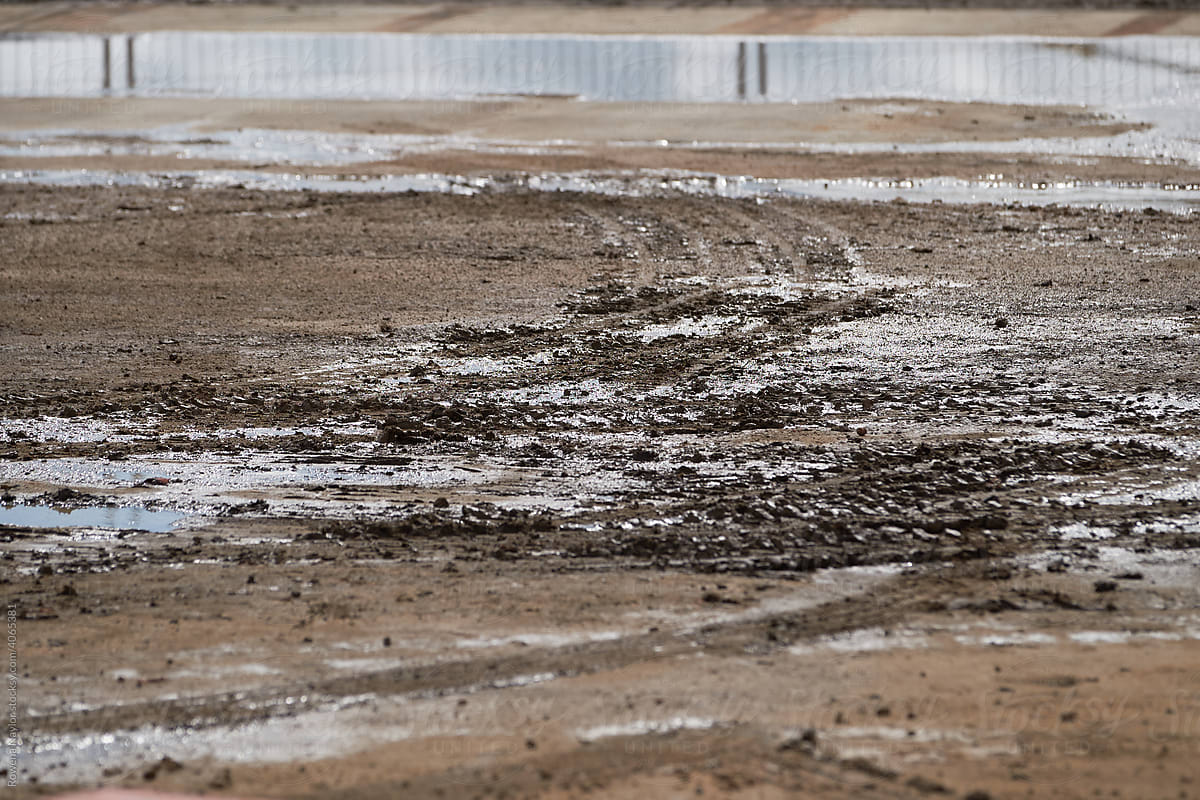Muddy oily ground before drilling rig clean-up