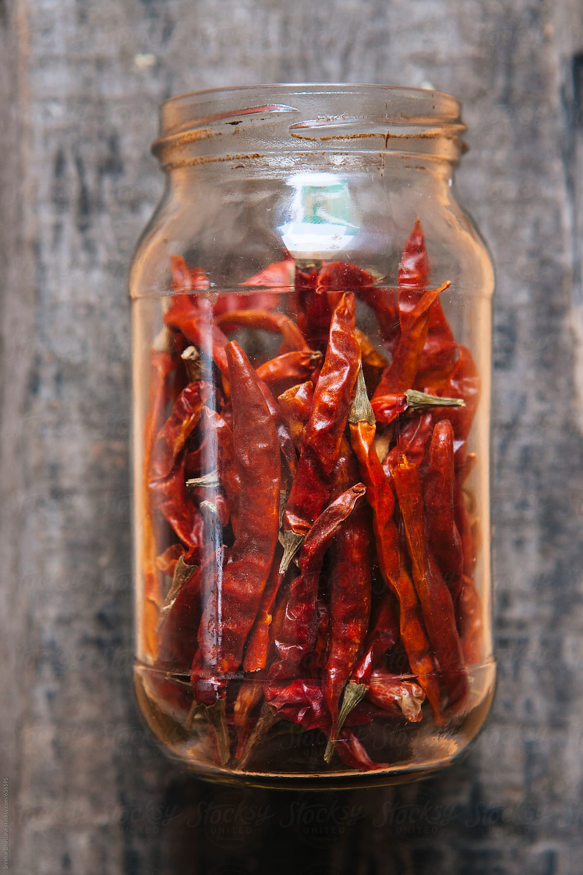 Jar of dried red chilies.