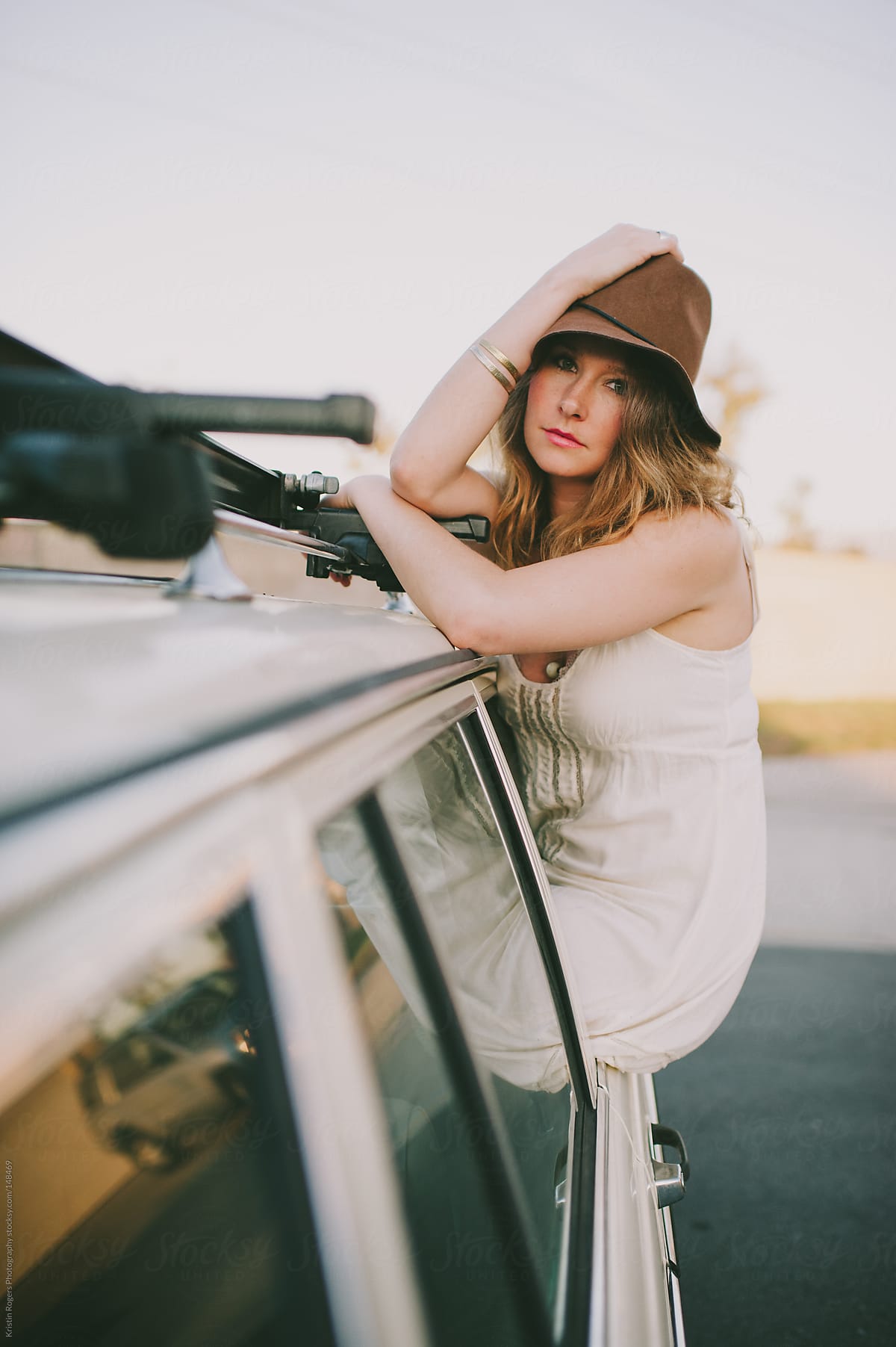 Young Woman Leaning On A Car And Using Smart Phone Stock Photo - Download  Image Now - Car, House, One Woman Only - iStock
