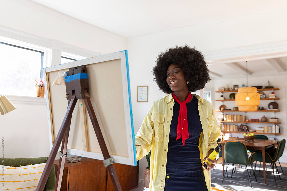 African American Lifestyle Girl artist Painting easel with scarf